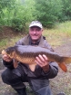 12lbs 2oz carp common from private quarry nr doncaster. got this carp on sweetcorrn , my darkest  carp I have ever cought,...