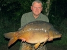 Andy Laurie 37lbs 8oz Carp from Sweet Chestnut Lake using Mainline Quad.. Quad boile over sweetcorn & crushed boilies close in