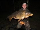 Andy Laurie 30lbs 3oz 4dr Carp from Sweet Chestnut Lake using UK glugged tigers.. bait boated ledger to far margin under trees