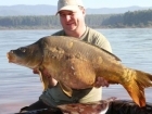39lbs 4oz mirror Carp from private using Nutrabaits.. Just got back from my holiday in Africa, Its a fantastic place and 
would recommend anyone going there.
All the fish are extremely hard