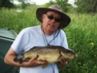 Clive Wells 9lbs 4oz Common Carp from Kingfisher Lakes. Caught on multi red maggots.