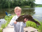 6lbs 1oz LargeMouth Bass from Mississippi River. Jaret (7 years old) with a nice 6 pound LargeMouth Bass
