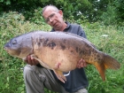 David Trew 28lbs 4oz Mirror Carp from Walthamstow Reservoirs using nash scopex squid with robin red.. this was part of a 5 fish catch which included 3 double and a 31lb,14 mirror