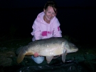 Kirsty Barnett 17lbs 9oz carp from Bain Valley Fisheries using Spicy tuna and sweet chilli.