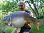 25lbs 8oz Mirror Carp from Sweet Chestnut Lake using Mistral Crab and Crawfish 15mm.. Standard semi-fixed leger tactics to far margins. My wife, Val, took a 26lb 6oz Mirror in the same session.