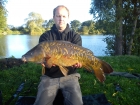 14lbs 3oz fully scaled mirror from local club water using baitcraft t1.