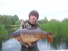 Josh Jackson 24lbs 5oz Common Carp from Carthagena Fishery. The sun was just hinting behind carthagena's famous gravel works and two baits were positioned on two nice silt areas out in front of the
