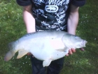 Ashley Orrow 10lbs 4oz Mirror Carp from Cudmore Fisheries. dog biscuit