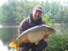 Paul Fletcher 25lbs 2oz Mirror Carp from Les Burons Carp Fishing using Mainline Fusion.. Caught fishing to right side of island in 3 feet of water. Using Century NG Rods, Shimano 6000GTE reels, 15lbs