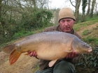 31lbs 0oz Mirror Carp from Rookley Country Park using ice red.