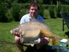 Daniel William Spreckley 32lbs 0oz Mirror Carp from Les Croix using tiger nut flavoured boilie.. This was a really feisty fish, as it took me half an hour to get in. This fish i had right down the