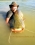 Globetrotter, TONY DAVIES-PATRICK  returns a big catfish to the river.